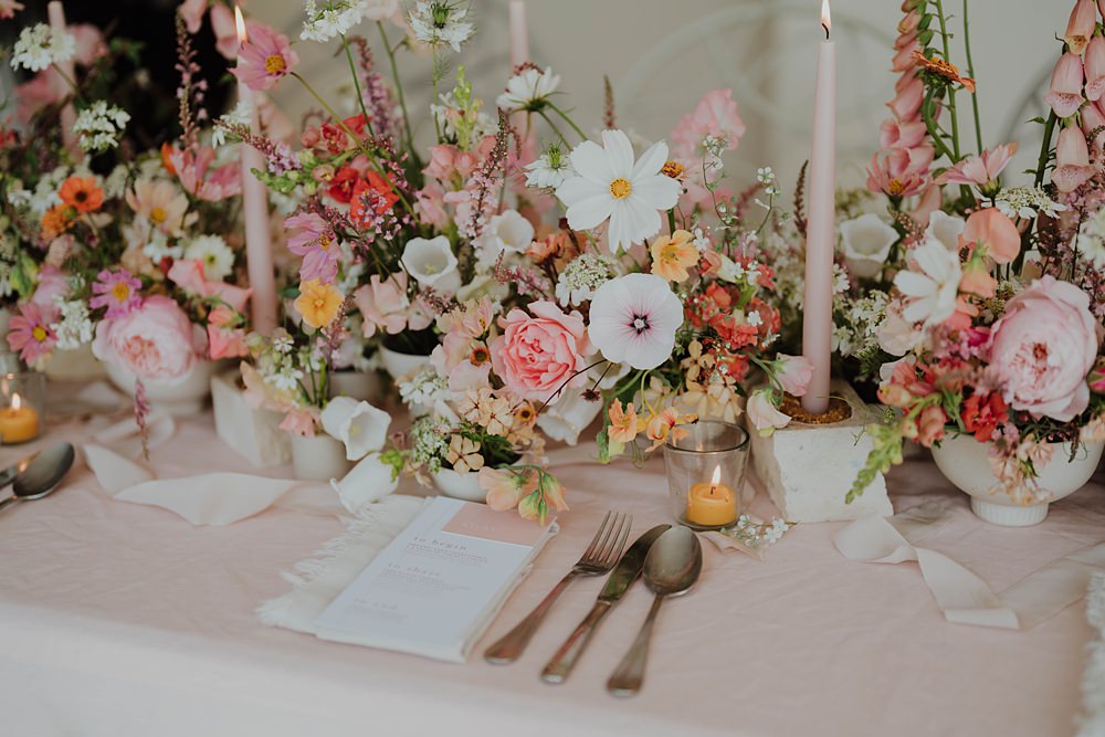 Spring Cotswolds Wedding Ideas Mei Lou Photography Pink Peach Flowers Centrepiece Table Candles