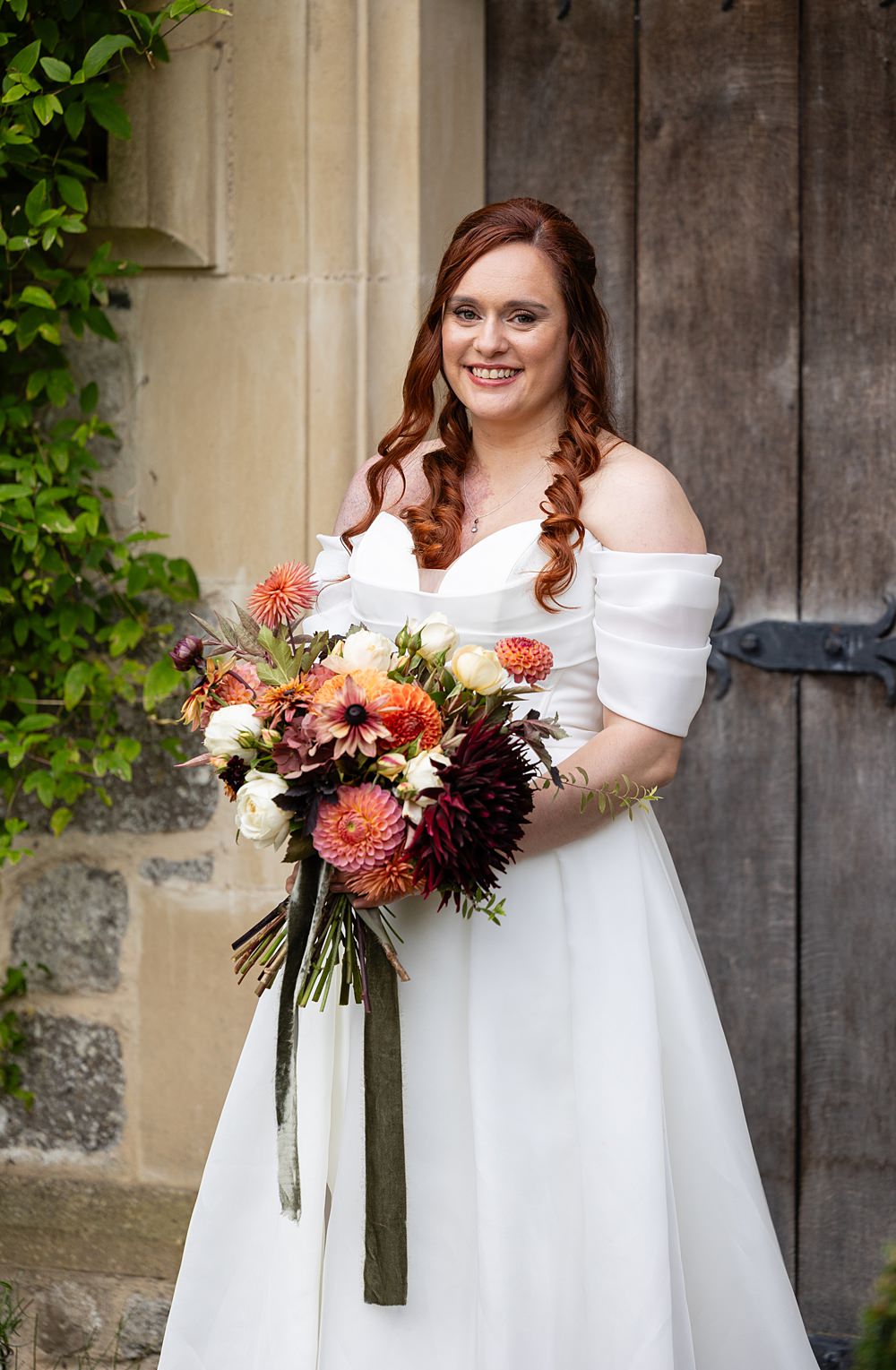 The Courtyard Venue Wedding Ideas Nicki Jones Photography Orange Red Autumn Dahlia Bouquet