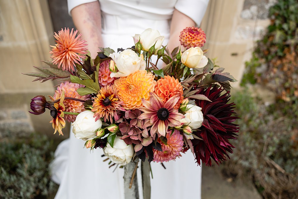 The Courtyard Venue Wedding Ideas Nicki Jones Photography Orange Red Autumn Dahlia Bouquet
