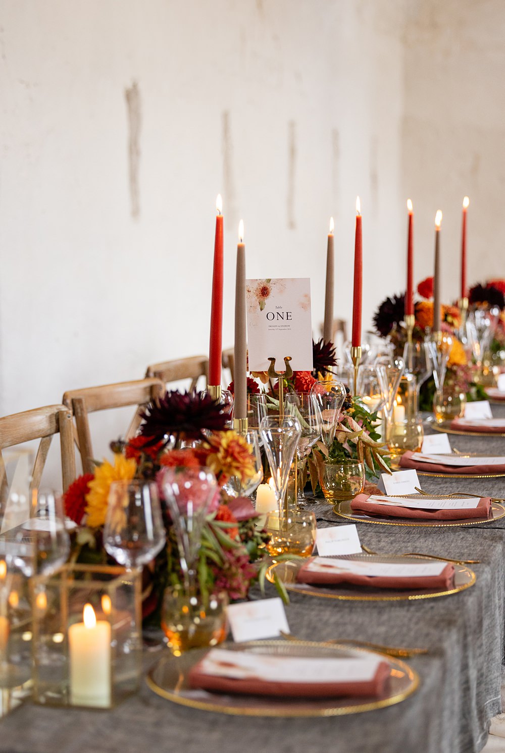 The Courtyard Venue Wedding Ideas Nicki Jones Photography Long Table Grey Cloths Orange Red Candles Flowers Autumn Decor