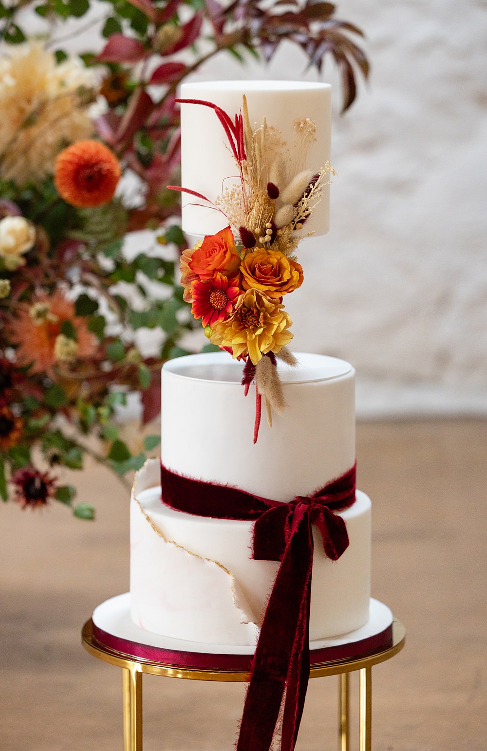 The Courtyard Venue Wedding Ideas Nicki Jones Photography Invisible Tier Cake Red Ribbon Flowers