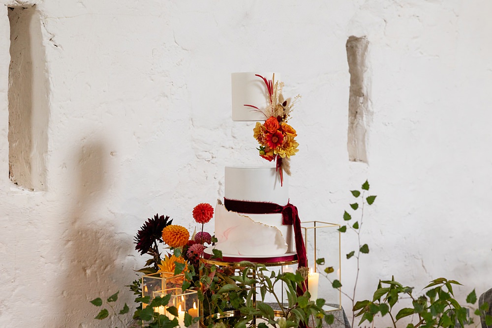 The Courtyard Venue Wedding Ideas Nicki Jones Photography Invisible Tier Cake Red Ribbon Flowers