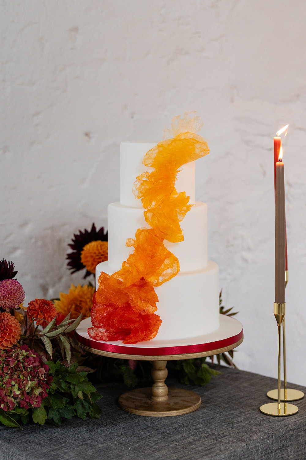 The Courtyard Venue Wedding Ideas Nicki Jones Photography Ombre Cake Red Yellow Orange 3 Tier