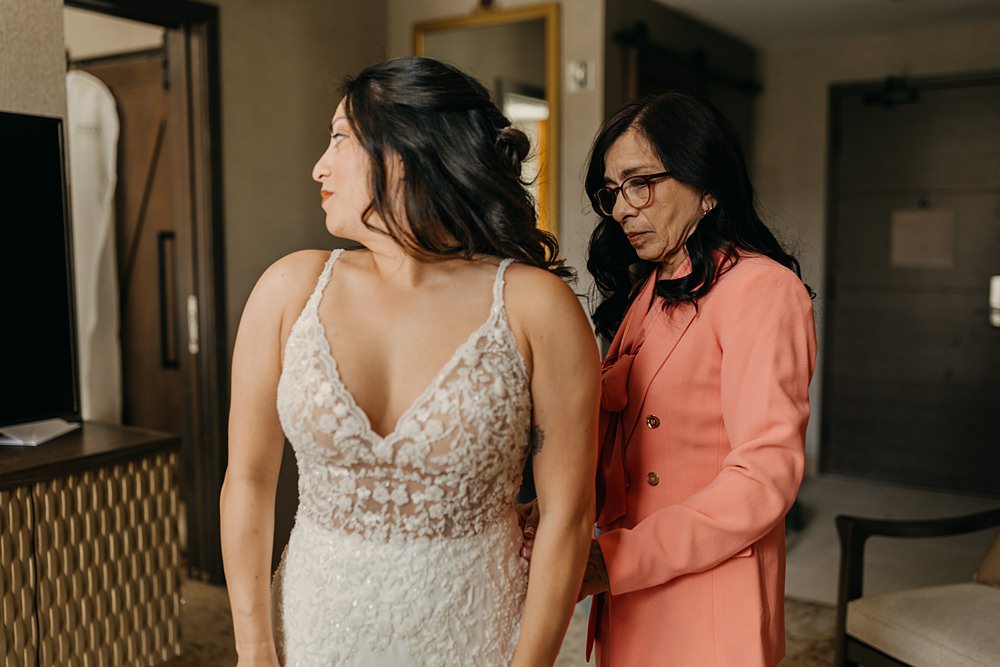 The Red Earth Venue Wedding Adventure and Vow Strappy Lace Gown Bride