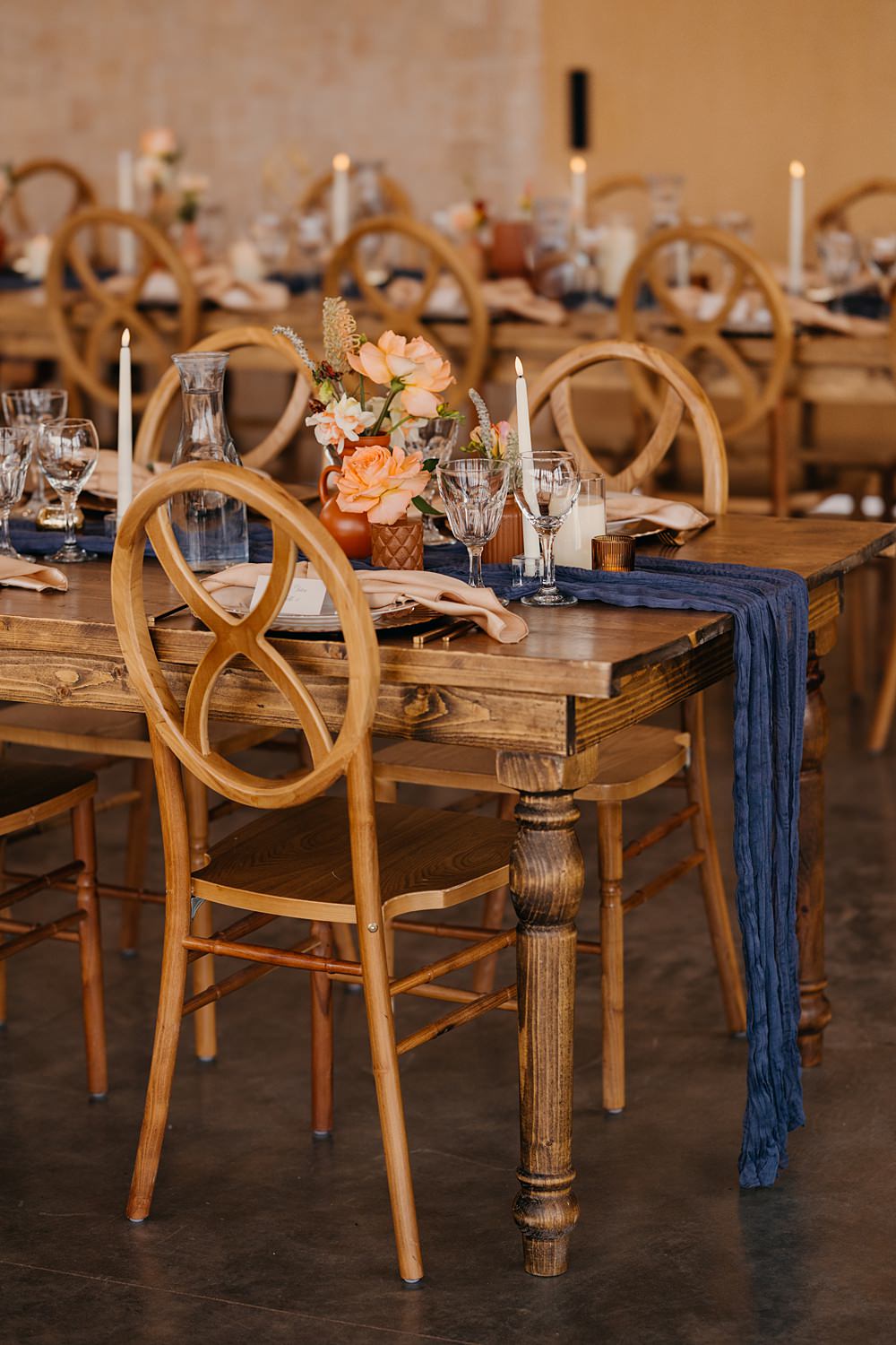 The Red Earth Venue Wedding Adventure and Vow Rustic Table Blue Runner Orange Flowers Candle