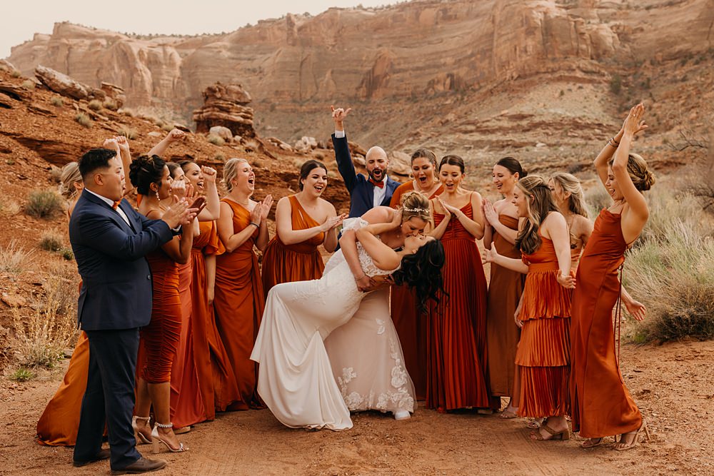The Red Earth Venue Wedding Adventure and Vow Mismatched Orange Bridesmaid Dresses