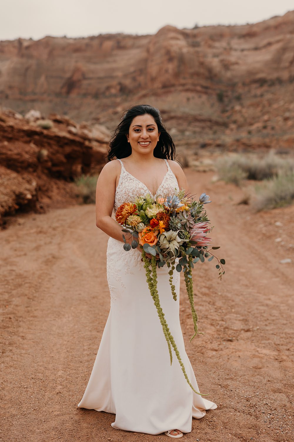 The Red Earth Venue Wedding Adventure and Vow Vow Strappy Lace Gown Bride