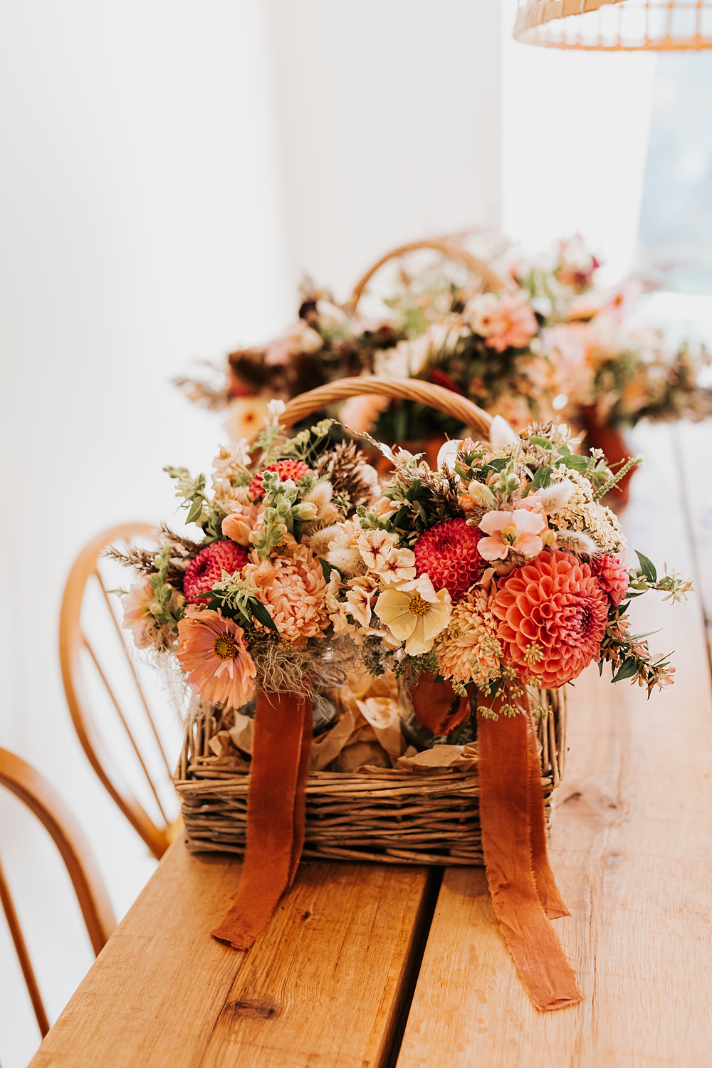 Chidham Barn Wedding Lucy Davis Photography Basket Flowers Autumn