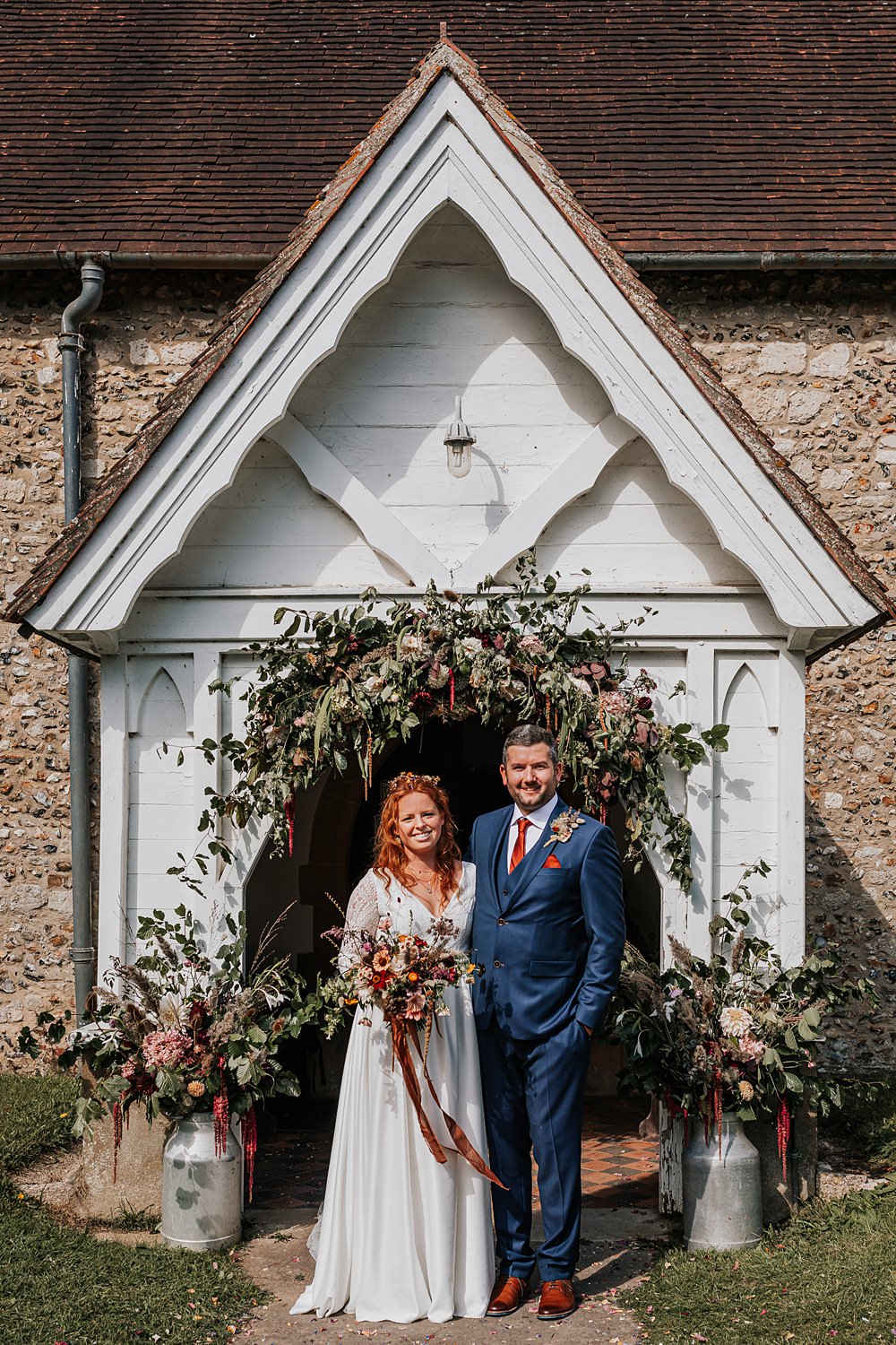 Chidham Barn Wedding Lucy Davis Photography Church Doorway Arch Flowers