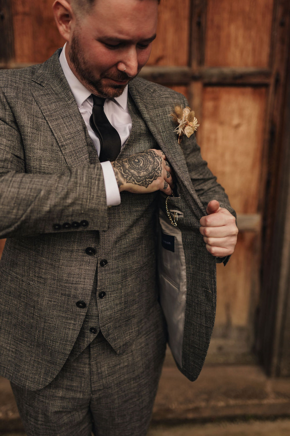 Disco Boho Wedding The Chamberlins Groom Suit Grey Black Tie