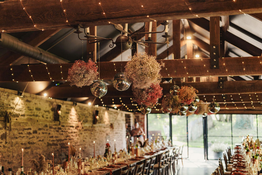 Disco Boho Wedding The Chamberlins Gypsophila Cloud Disco Ball Barn Decor