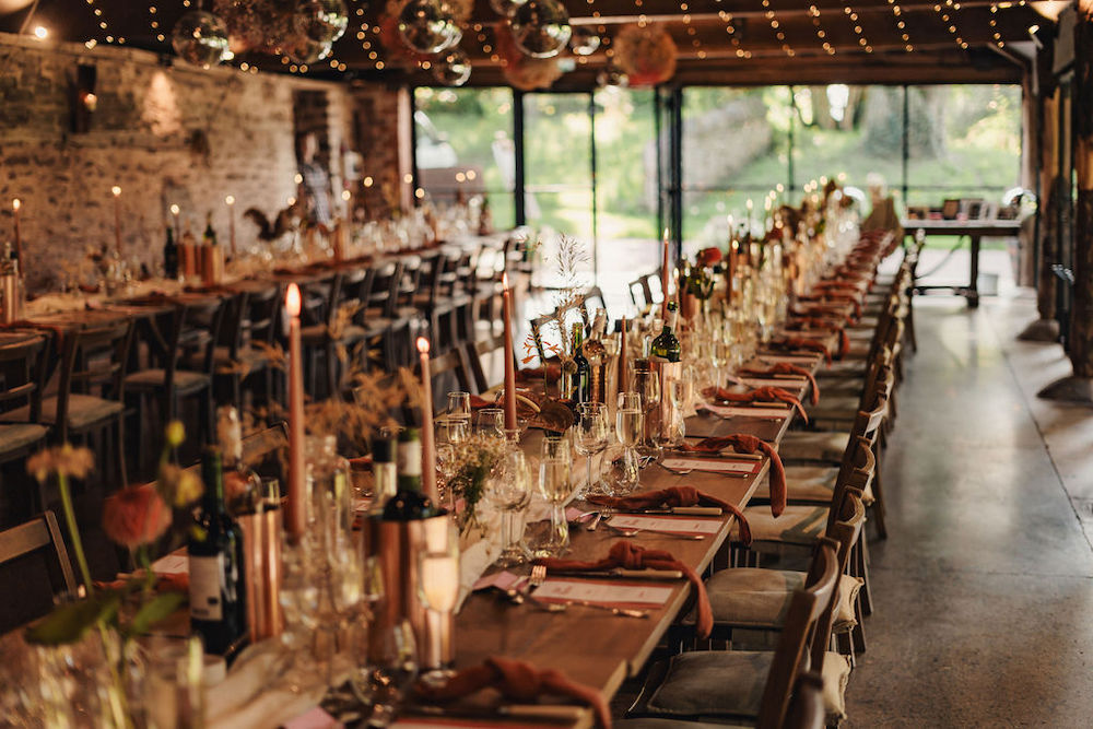 Disco Boho Wedding The Chamberlins Table Decor Runner Flowers Napkins Rust Wood