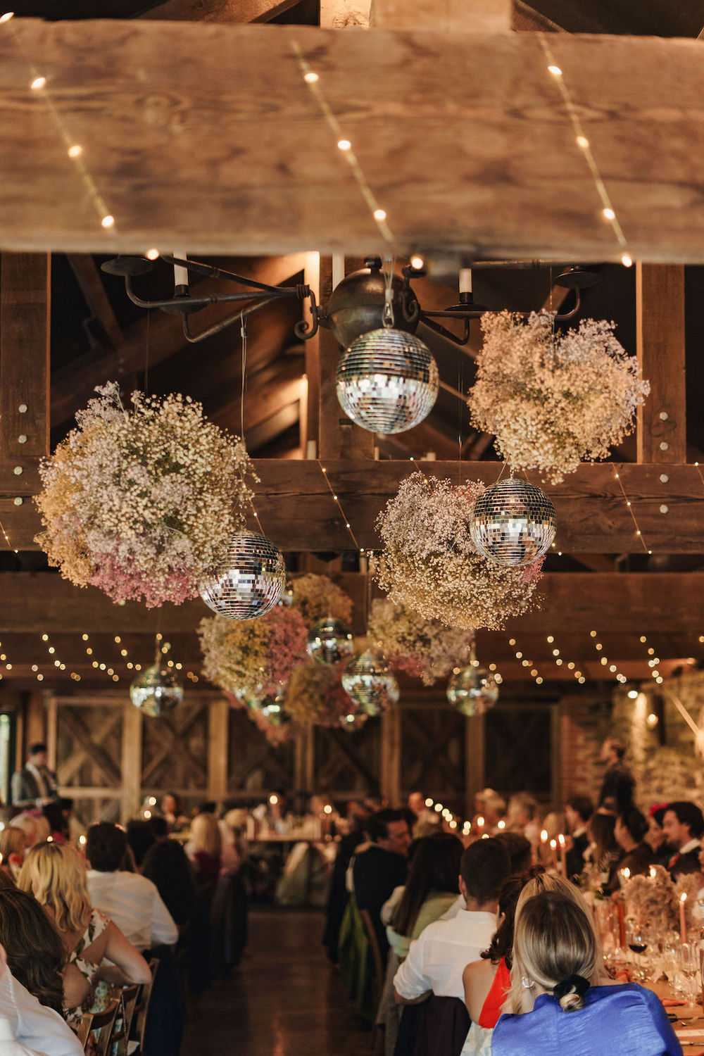 Disco Boho Wedding The Chamberlins Gypsophila Cloud Disco Ball Barn Decor