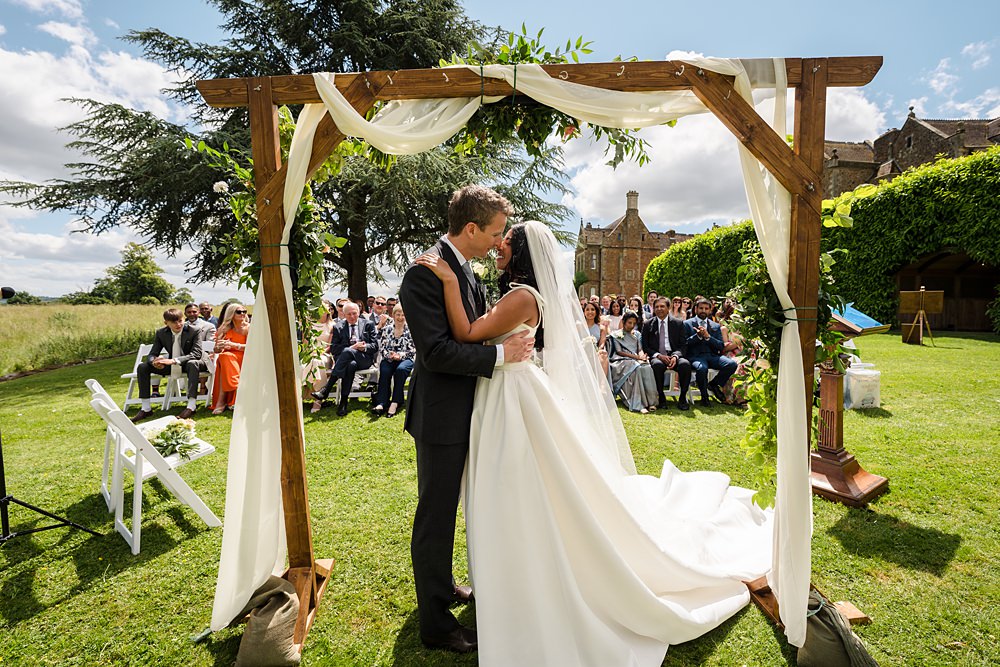 Fawsley Hall Wedding Sky Photography Wooden Ceremony Arch Drapes