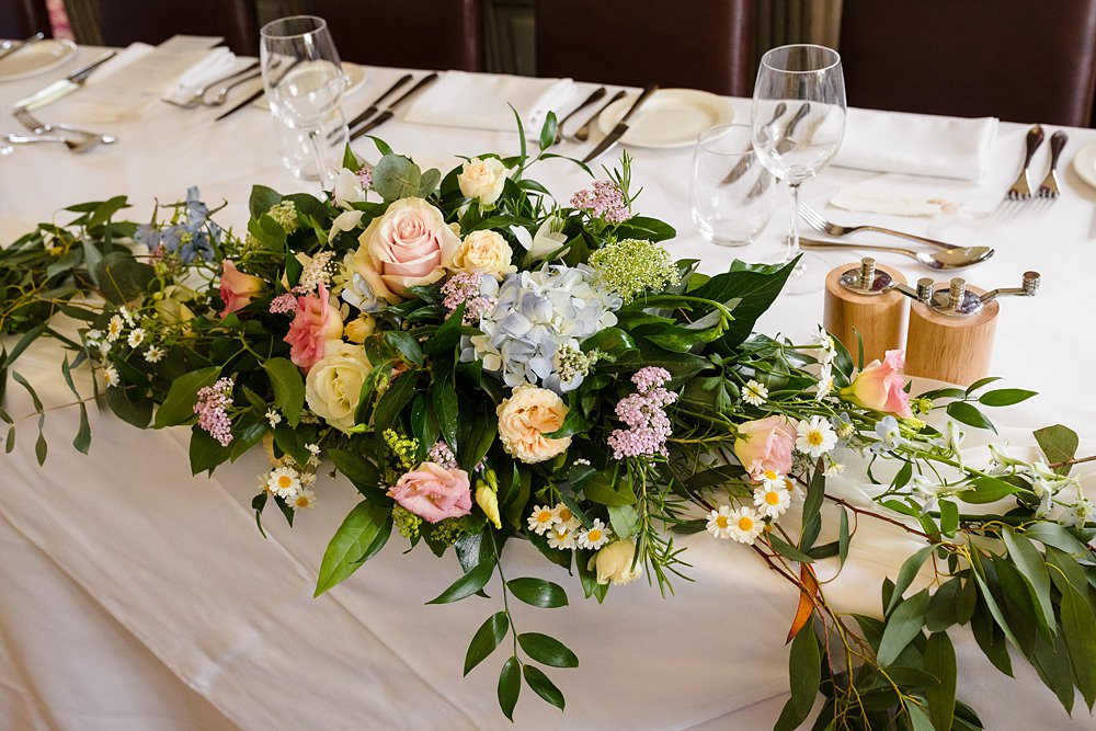 Fawsley Hall Wedding Sky Photography Top Table Flower Decor
