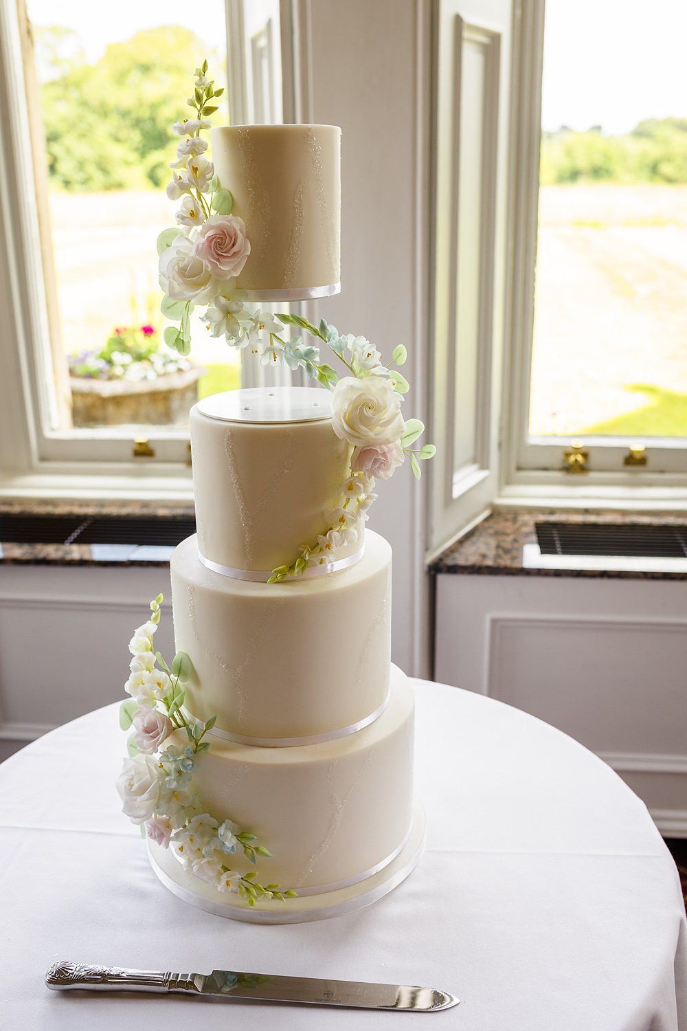 Fawsley Hall Wedding Sky Photography 4 Tier White Cake Flowers
