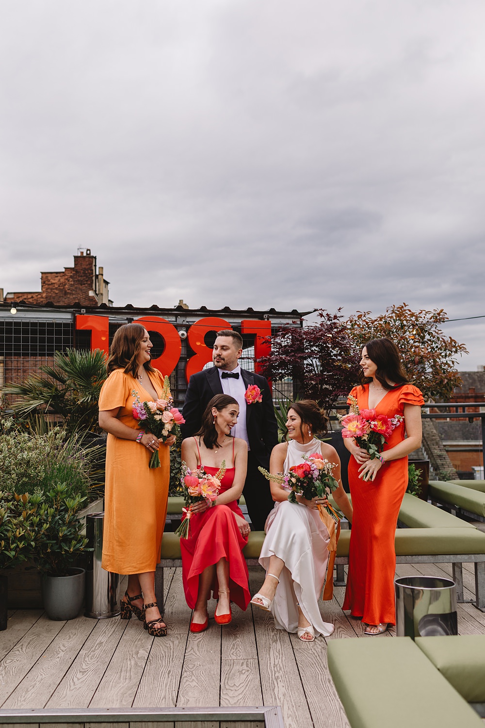 Headrow House Wedding Louise Barry Photographer Red Orange Pink Bridesmaid Dresses Mismatched Bridesman