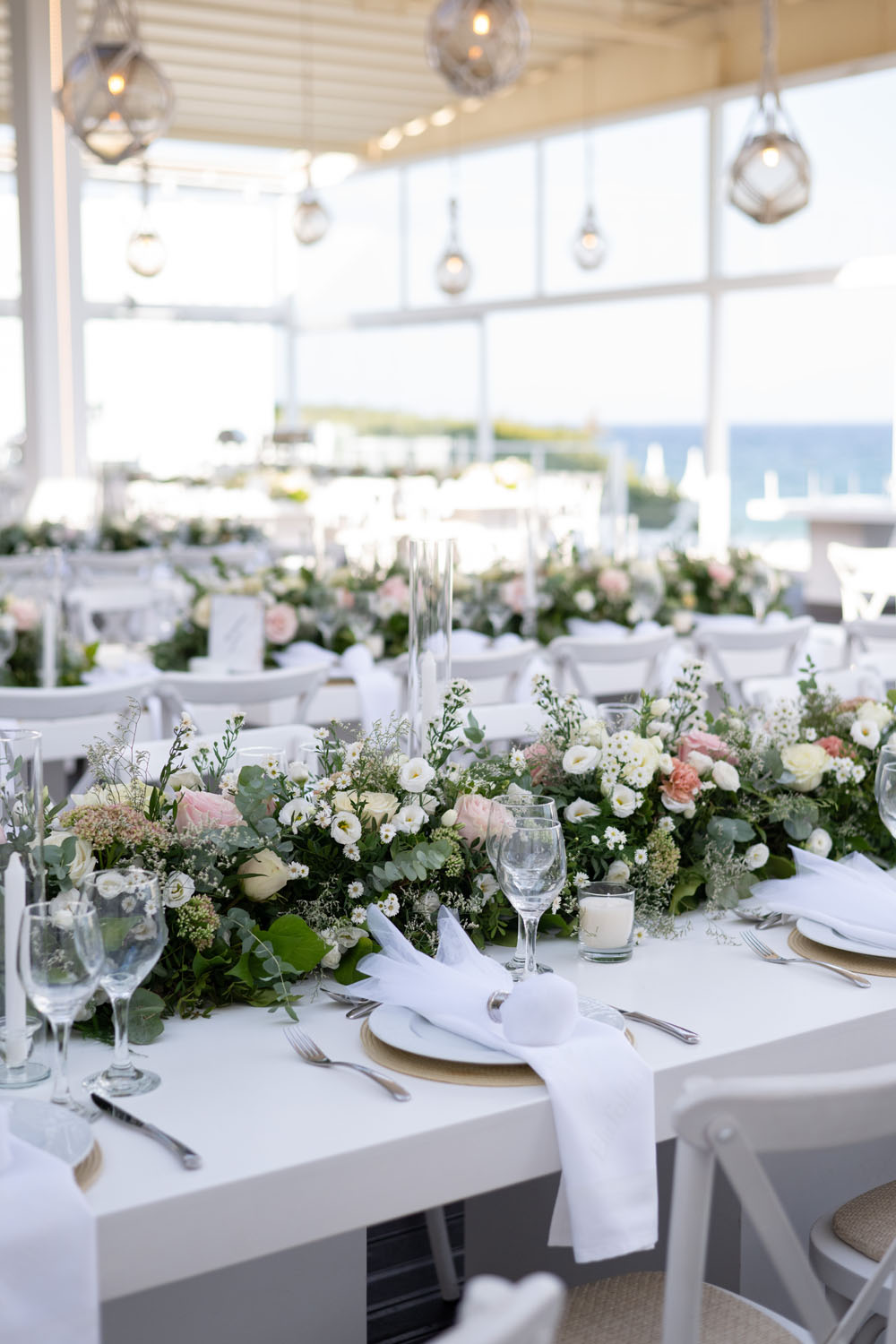 Sea Soul Wedding Moments To Keep Photography Long Tables White Cloths Candles Greenery Pink Flower Runner