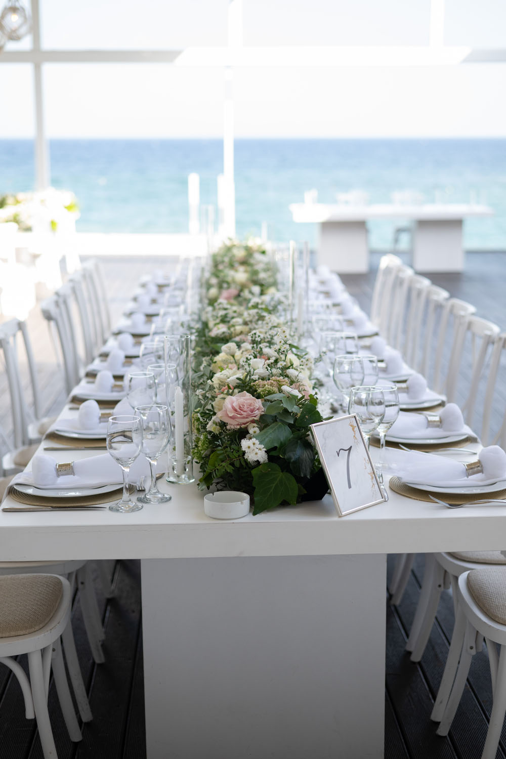 Sea Soul Wedding Moments To Keep Photography Long Tables White Cloths Candles Greenery Pink Flower Runner