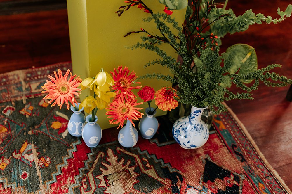 Dinner Party Wedding Lou Rob Photo Yellow Pillars Colourful Flowers Ceremony