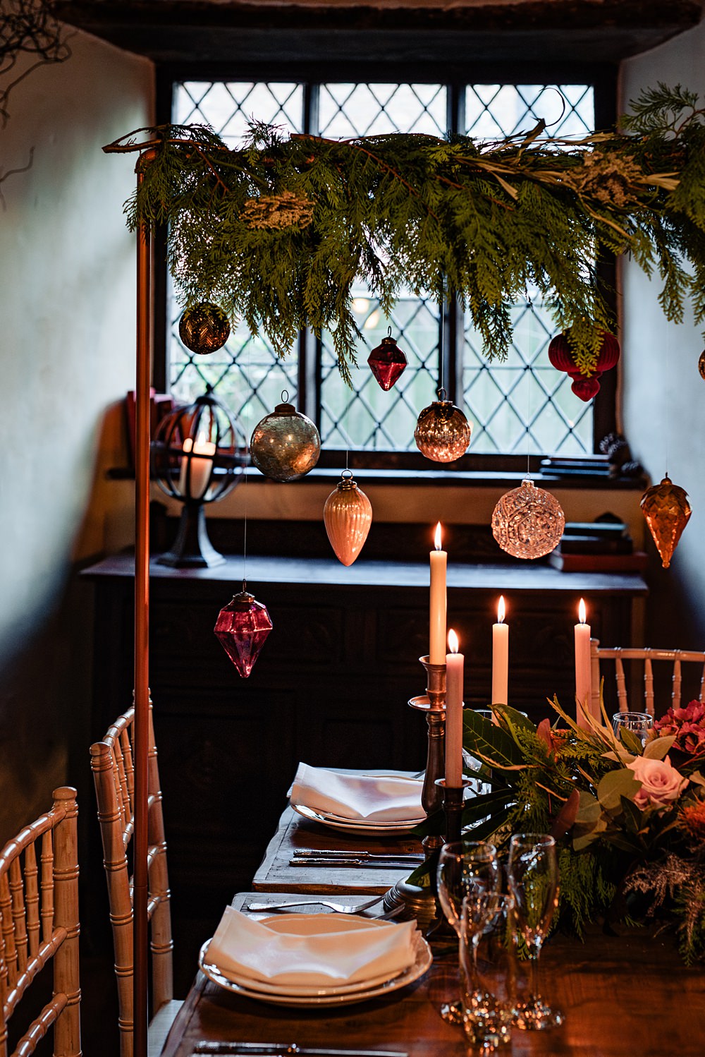 Vintage Winter Wonderland Wedding Ideas Natalia Case Photography Wooden Table Christmas Greenery Baubles Decor Candles Flowers