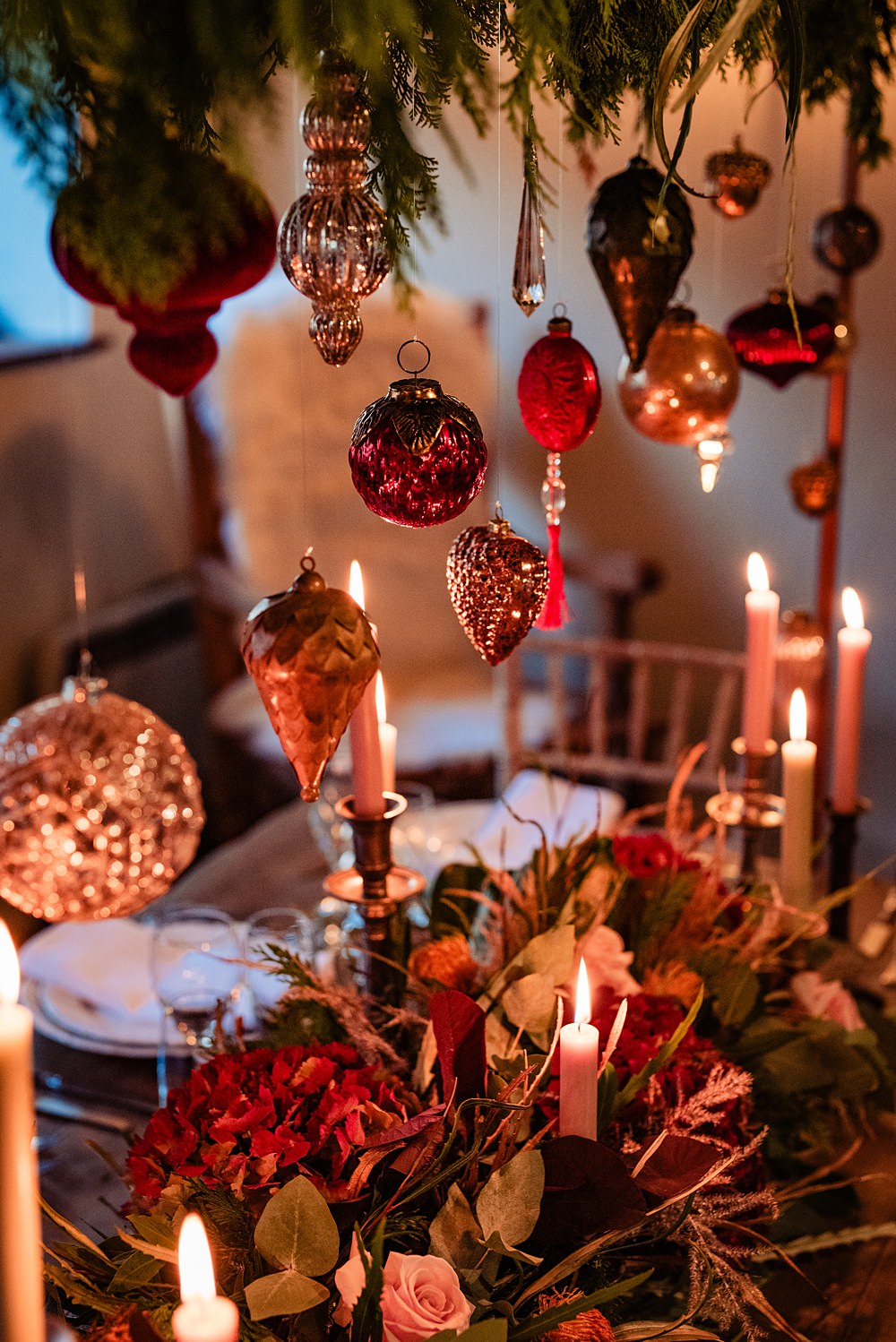 Vintage Winter Wonderland Wedding Ideas Natalia Case Photography Wooden Table Christmas Greenery Baubles Decor Candles Flowers