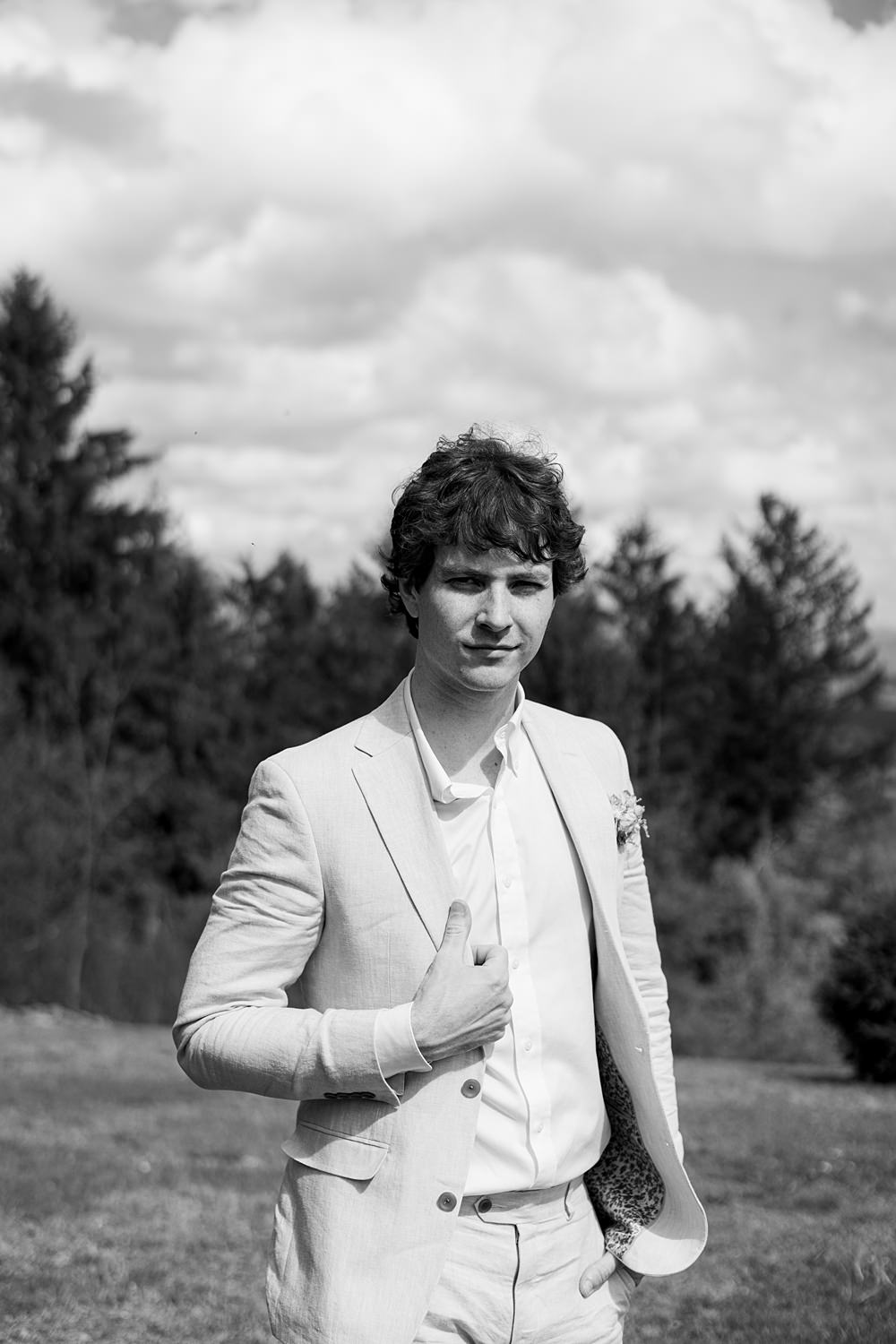 Cedar Lakes Estate Wedding Ideas Little But Fierce Photography Groom Cream Suit Open Collar Shirt