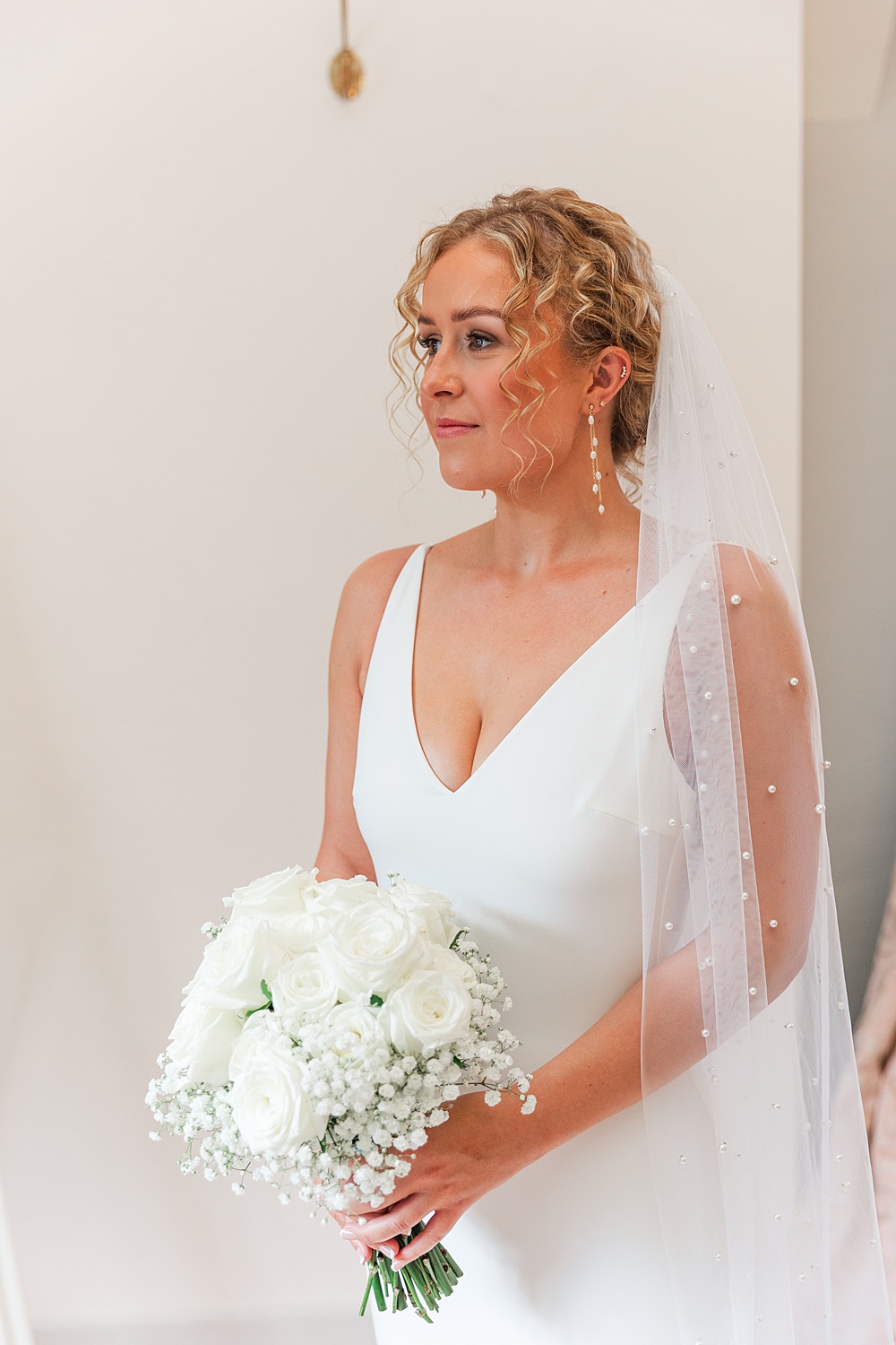 St Audries Park Wedding James and Kerrie Photography Bride Gown V Neck Pearl Veil White Rose Gypsophila Bouquet