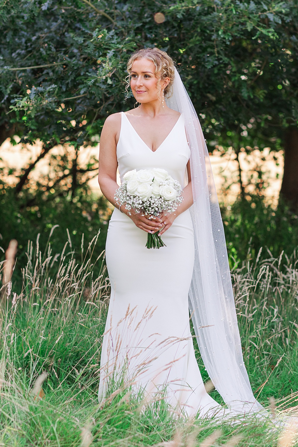 St Audries Park Wedding James and Kerrie Photography Bride Gown V Neck Pearl Veil White Rose Gypsophila Bouquet