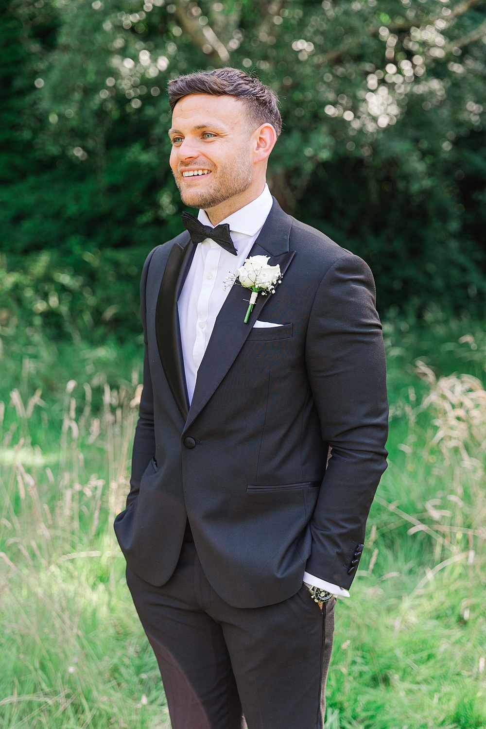 St Audries Park Wedding James and Kerrie Photography Groom Black Suit Bow Tie Tuxedo