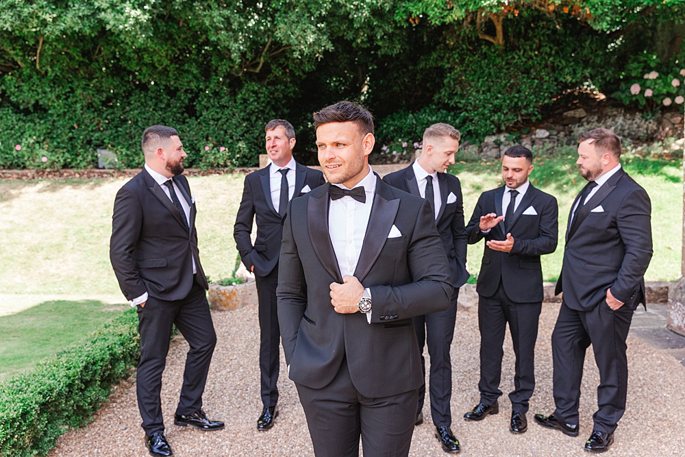 St Audries Park Wedding James and Kerrie Photography Groom Black Suit Bow Tie Tuxedo Groomsmen
