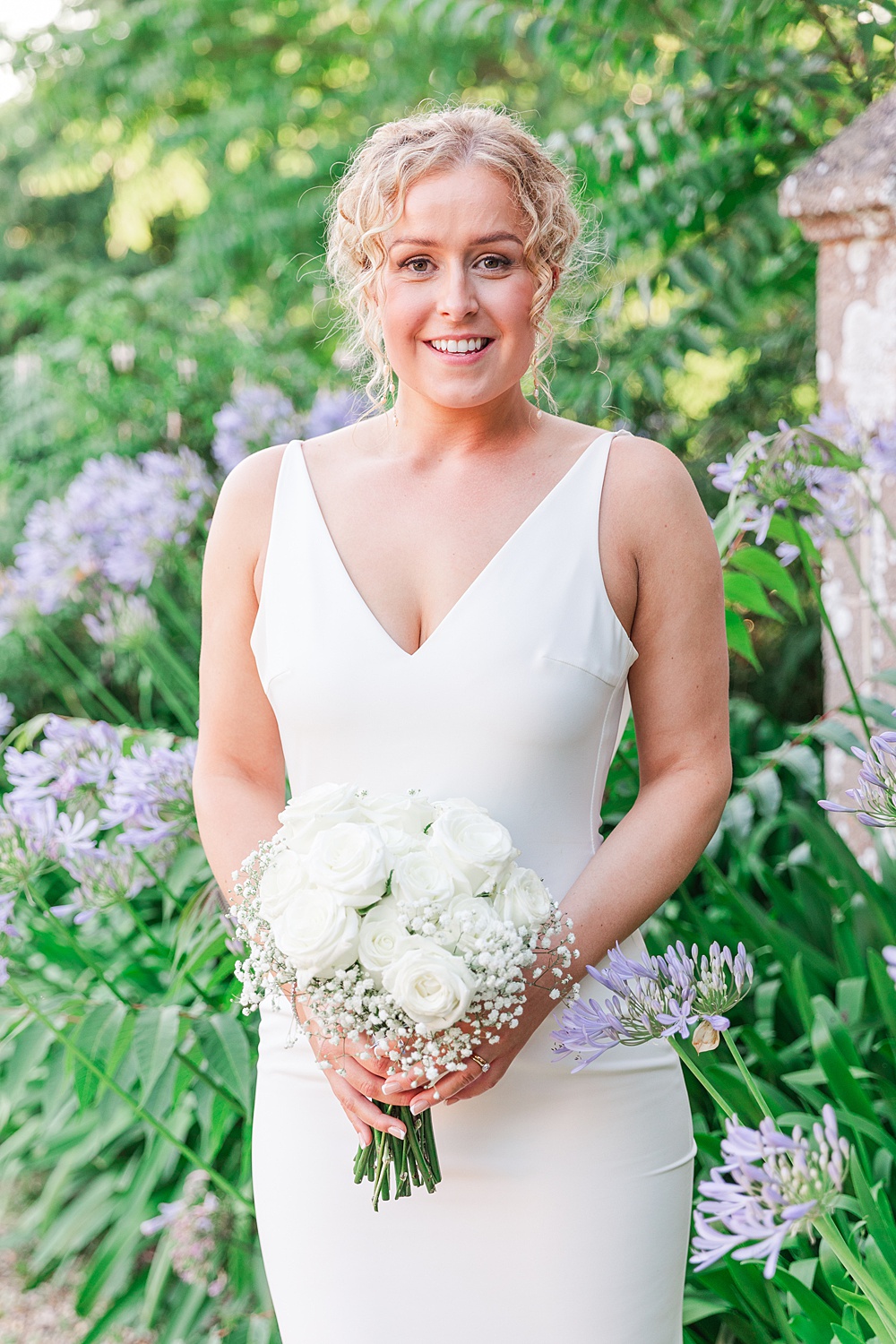 St Audries Park Wedding James and Kerrie Photography Bride Gown V Neck White Rose Gypsophila Bouquet