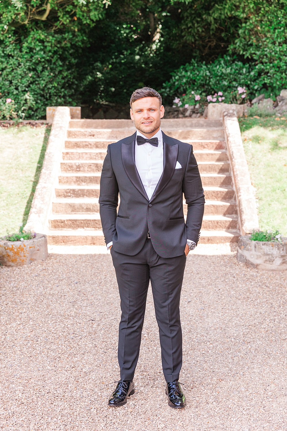 St Audries Park Wedding James and Kerrie Photography Groom Black Suit Bow Tie Tuxedo