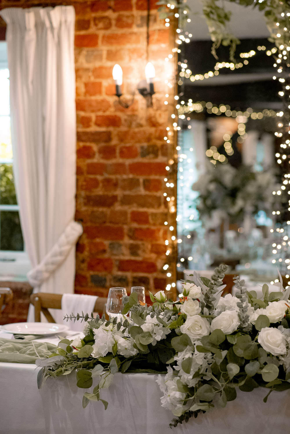The Old Mill Aldermaston Wedding Nicola Belson Photography Top Table Flowers Rose Greenery