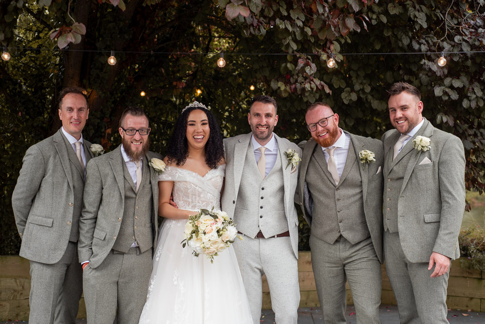 The Old Mill Aldermaston Wedding Nicola Belson Photography Cream Suit Pink Tie Groomsmen