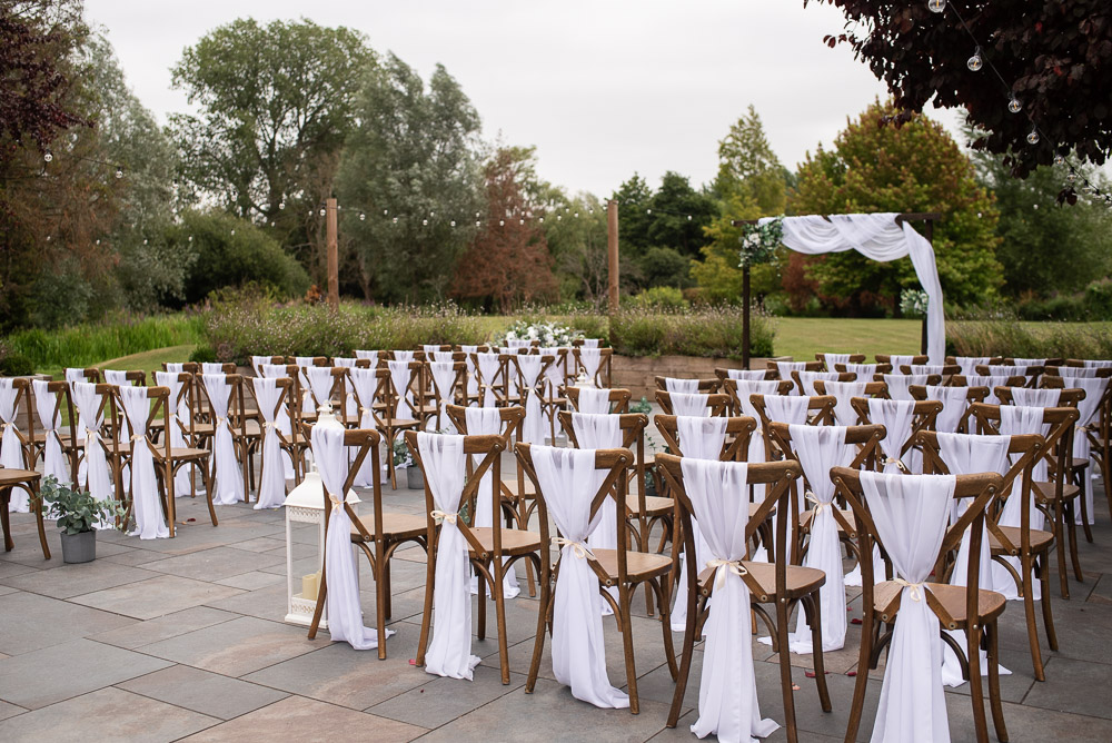 The Old Mill Aldermaston Wedding Nicola Belson Photography Ceremony Chairs Fabric Backs Lantern Aisle Decor