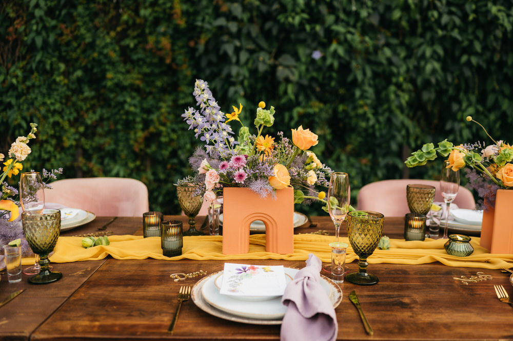 Antigua Guatemala Destination Wedding Daniel Lopez Perez Wedding Photography Centrepiece Flowers Yellow Lilac decor Candles Table