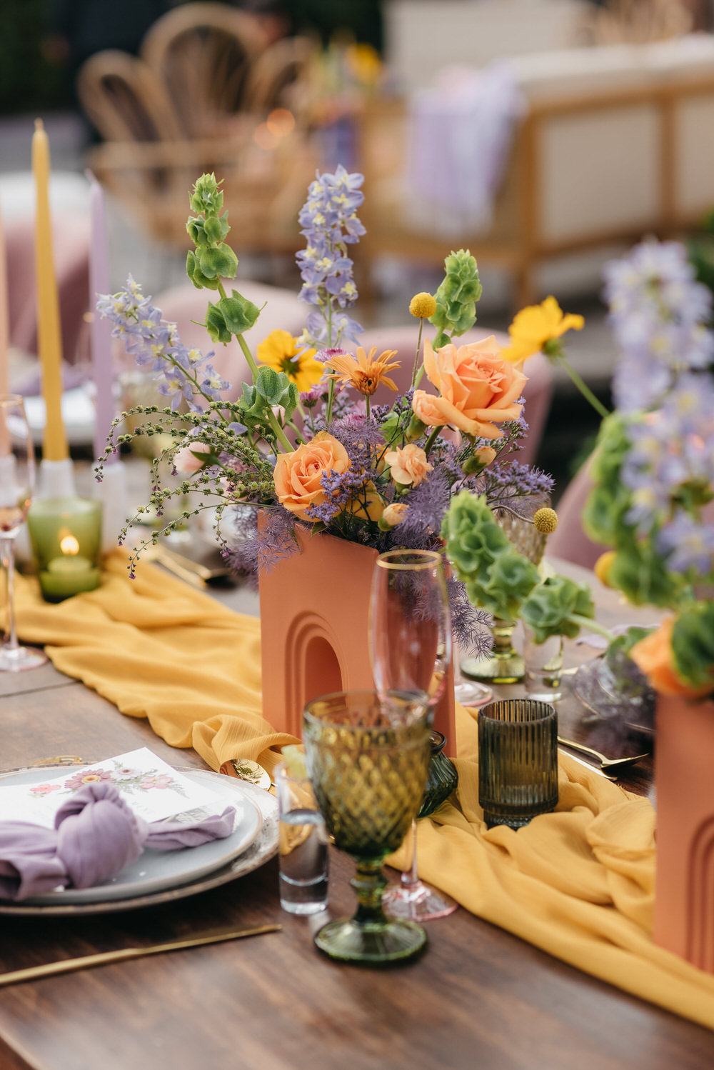 Antigua Guatemala Destination Wedding Daniel Lopez Perez Wedding Photography Centrepiece Flowers Yellow Lilac decor Candles Table