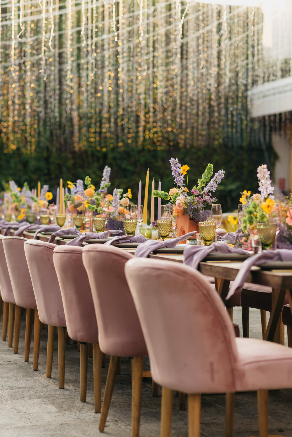 Antigua Guatemala Destination Wedding Daniel Lopez Perez Wedding Photography Centrepiece Flowers Yellow Lilac decor Candles Table Fairy Lights