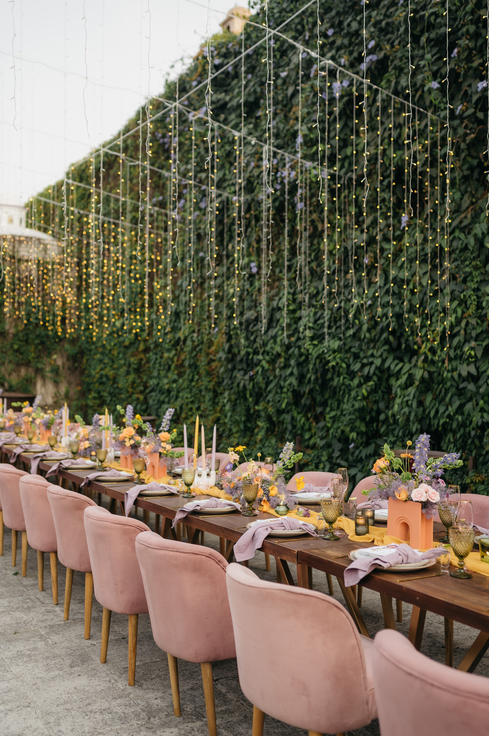 Antigua Guatemala Destination Wedding Daniel Lopez Perez Wedding Photography Fairy Lights Centrepiece Flowers Yellow Lilac decor Candles Table