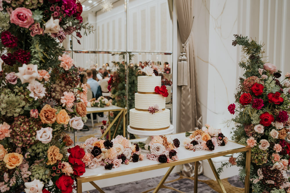 Flowers Cake Table Pillars Red Pink Orange Backdrop Tullyglass Hotel Wedding Sheena T Photography