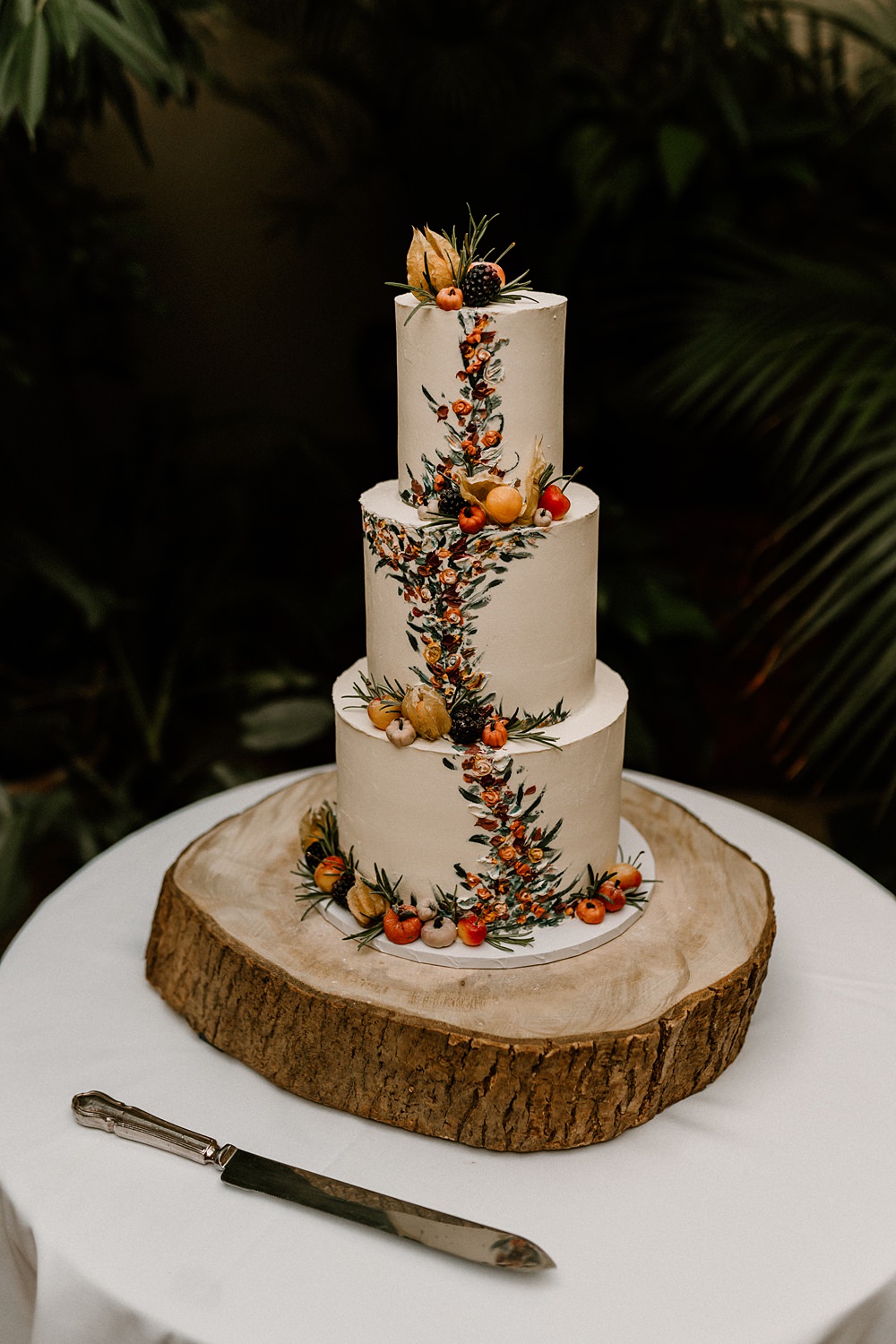 The Matara Centre Wedding Amy Woodham Photography 3 Tier Cake Autumn Fall Pumpkins Flowers Log Slice
