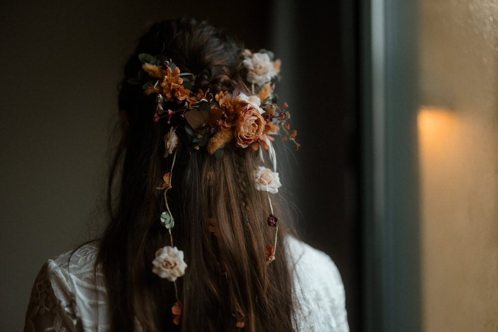 Reynisfjara Iceland Elopement Ast og Hraun Bride Hairstyle Half Up Flowers